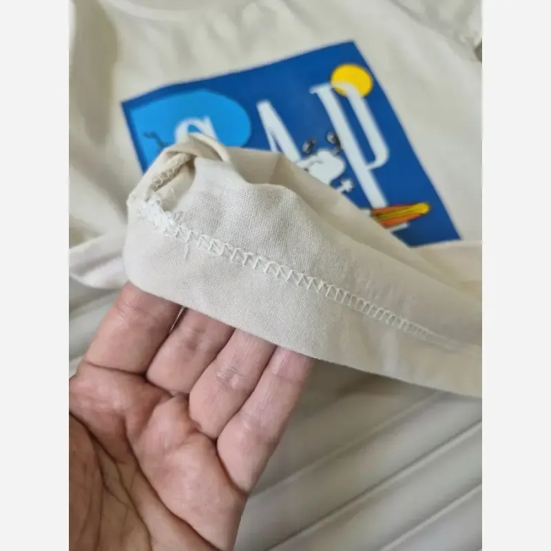 ست تابستانه تیشرت و شلوارک بچگانه طرح اسنوپی پنبهای 2 تا 7 سال - تصویر 3