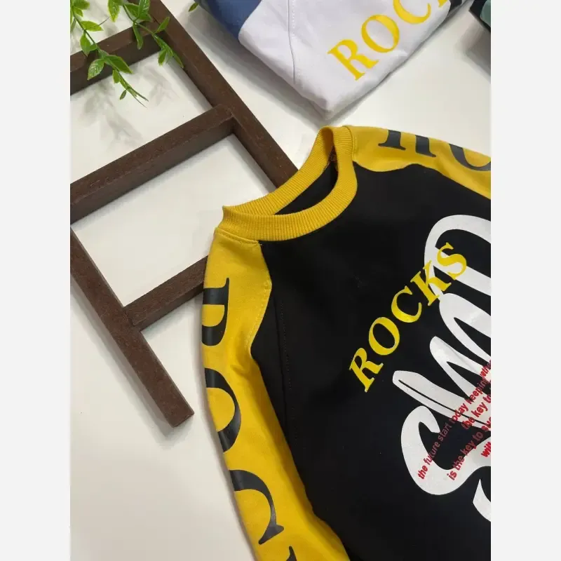 بلوز دورس بچگانه طرح ROCKS سایز 3 تا 14 سال - تصویر 2