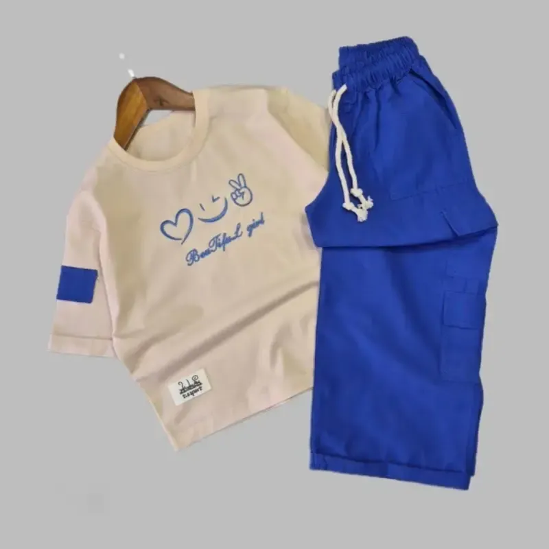 ست بلوز و شلوار دخترانه طرح لبخند جنس نخ پنبه و کتان مناسب 5 تا 12 سال - تصویر 4