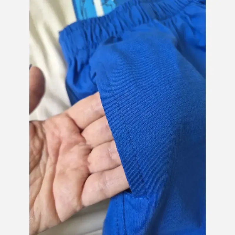 ست تابستانه تیشرت و شلوارک بچگانه طرح اسنوپی پنبهای 2 تا 7 سال - تصویر 4
