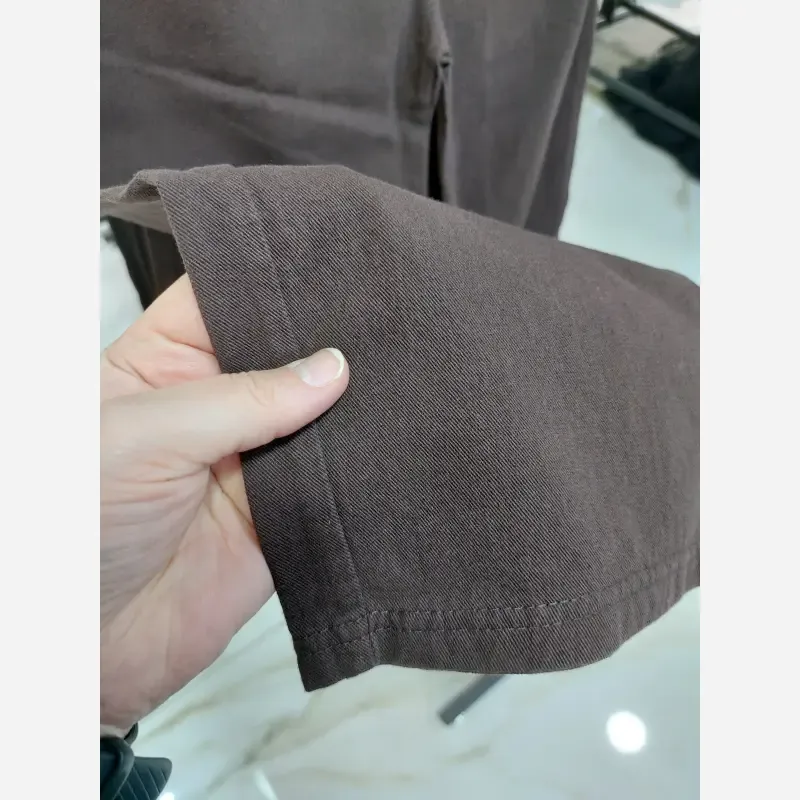شلوار کتان نیم بگ اسپرت دخترانه و پسرانه 5 تا 11 سال رنگ قهوه ای و کرم - تصویر 3