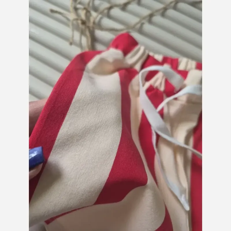 ست تیشرت و شلوارک بچگانه نخ پنبه طرح راه راه قرمز سایز 2 تا 7 سال - تصویر 6